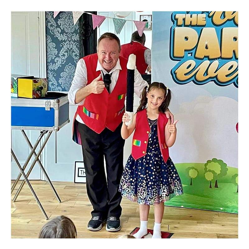 Bronze magic package entertainment showing magician with balloon modelling for smaller parties